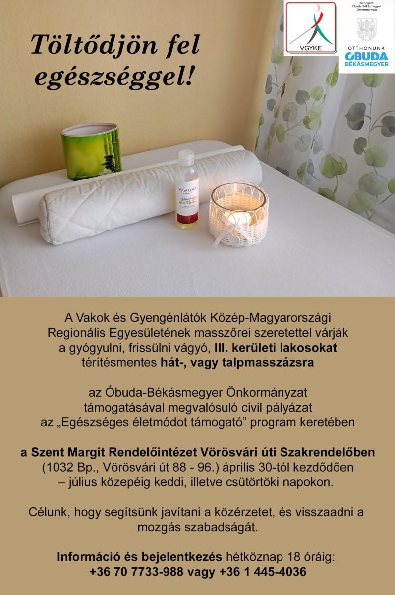 A képen a hirdetmény teljes szövege olvasható, felül a VGYKE és Óbuda logója látszik. Látható még egy masszázs ágy, fehér lepedővel és hengerpárnával, égő gyertyával és masszázsolajas üveggel.
